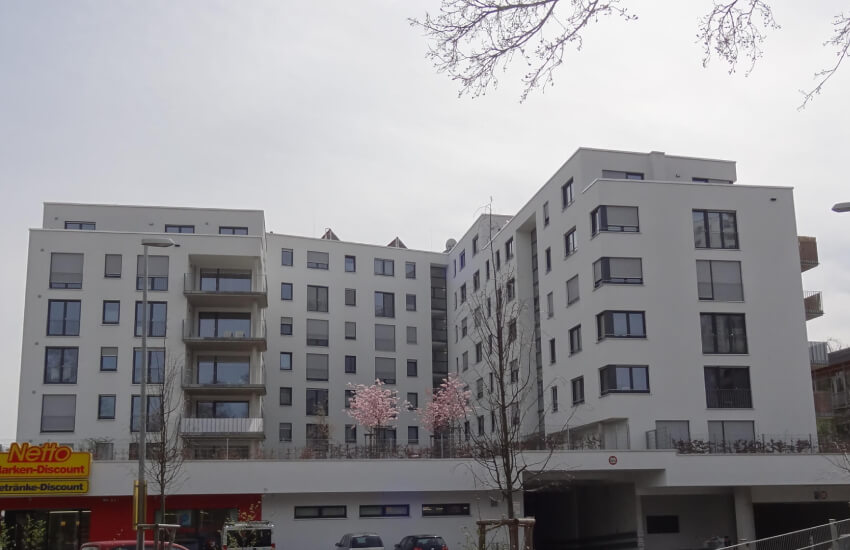  Gebäude mit 74 Wohnungen SB-Markt mit Tiefgarage 